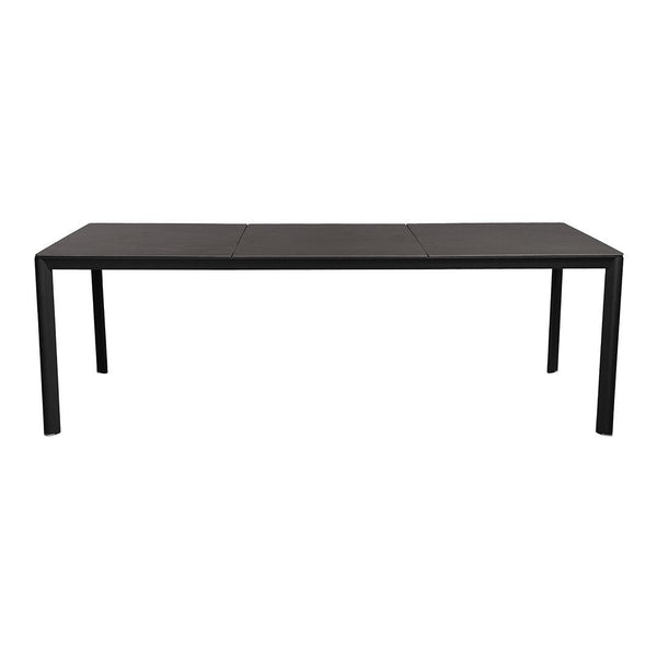 Sleek black dining table with a smooth, solid surface and minimalistic design. Perfect for modern interiors.