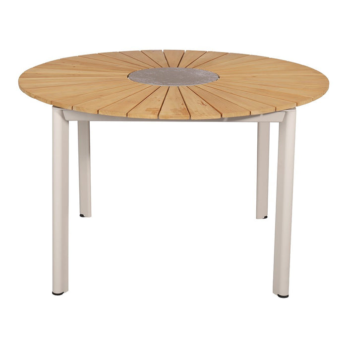 Round wooden dining table with a natural wood finish and sleek white metal legs, featuring a central circular pattern.