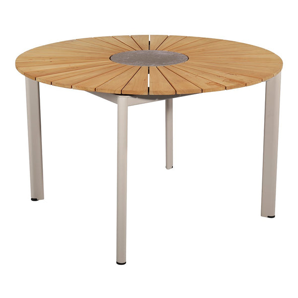 Round wooden table with natural wood finish and silver metal legs, featuring a circular pattern centerpiece.