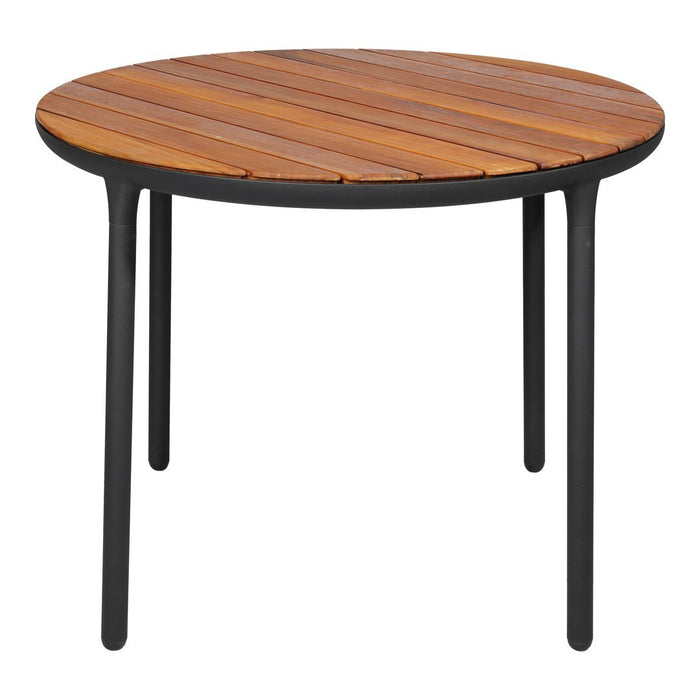 Round table with a warm brown wooden top and sleek black metal legs, showcasing a modern, minimalist design.