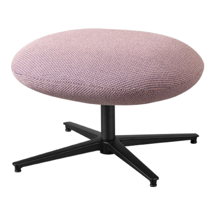 Round ottoman in textured pink fabric with a black base, featuring a modern, minimalist design.