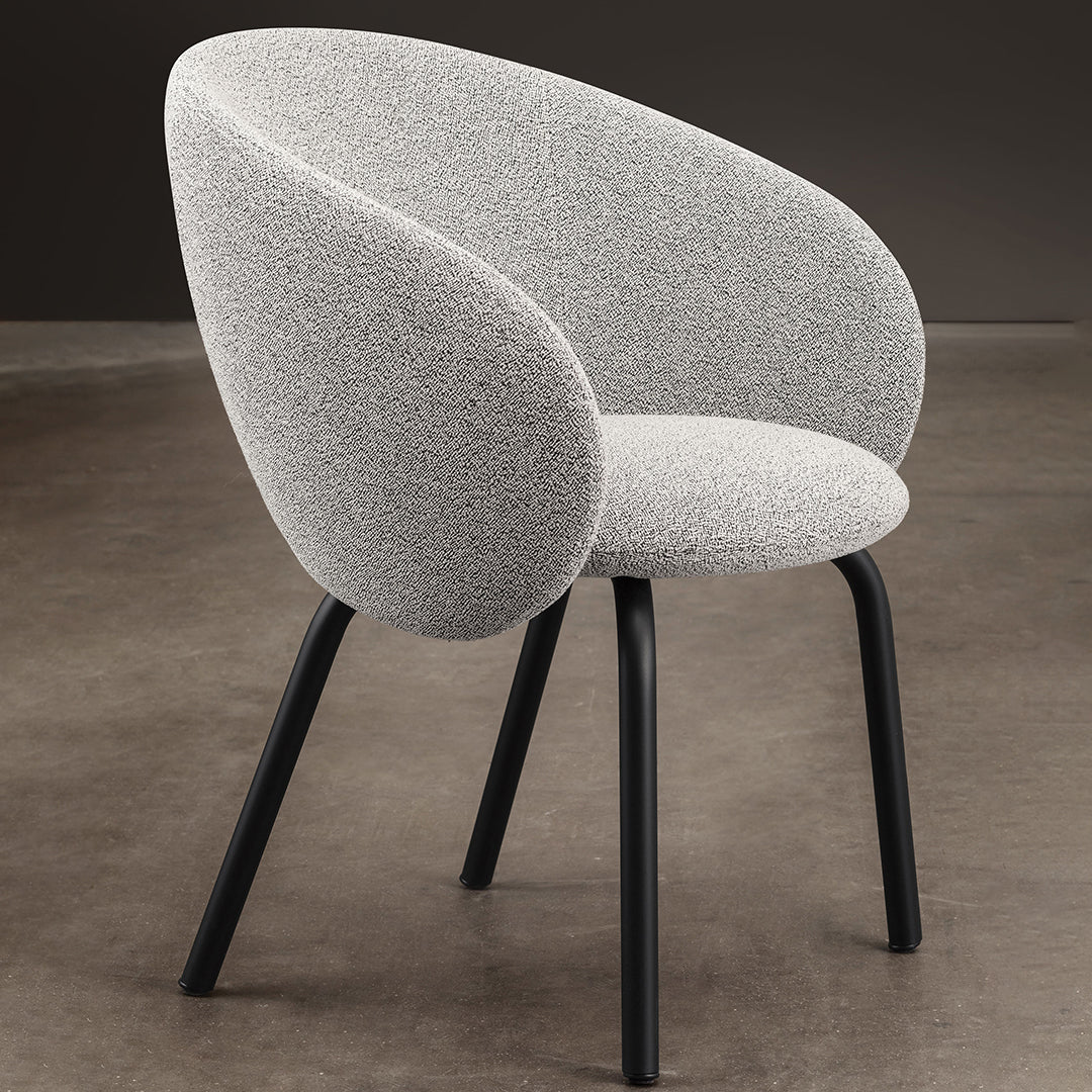 Gray textured fabric armchair with sleek black legs, perfect for modern and minimalist decor settings.