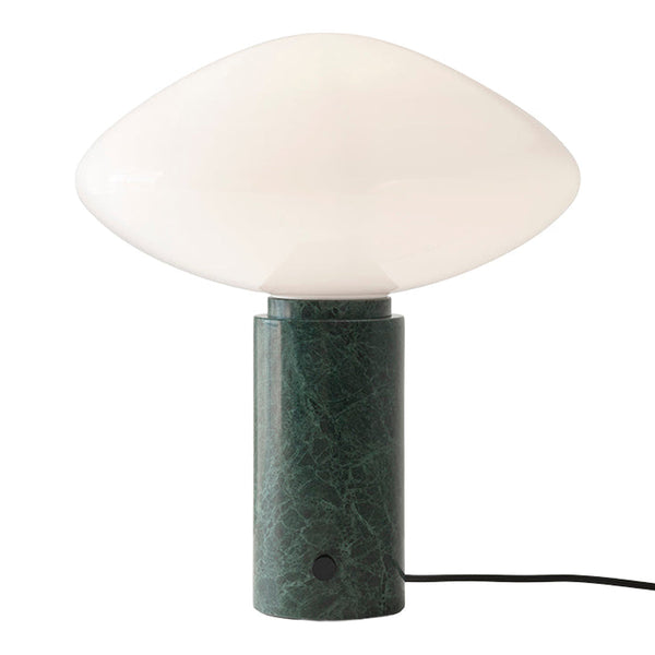 Green marble base with a smooth, white glass dome shade, creating a modern and elegant lighting accent.