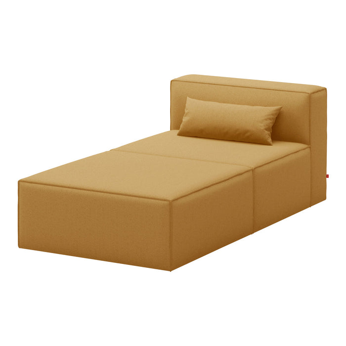 Sleek, minimalist bed in warm mustard yellow with a smooth, solid fabric texture and a complementing lumbar pillow.