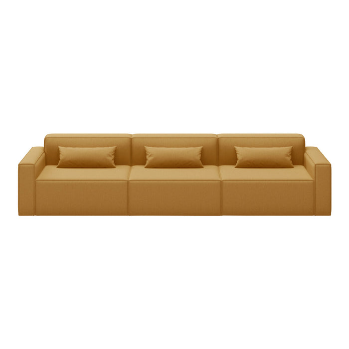 "Modern tan sofa with two matching cushions, featuring a clean, minimalistic design."