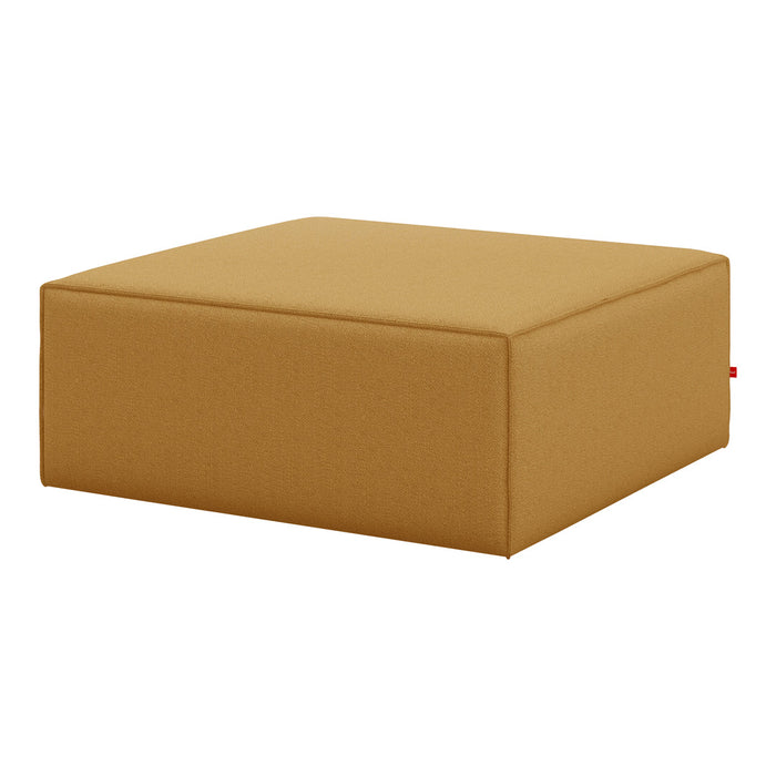 Solid mustard yellow ottoman with a minimalist design and sleek, square shape. Perfect for modern decor.