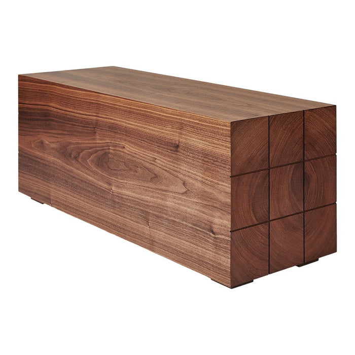 Solid walnut wood block with natural grain patterns and a rich brown color. Modern, minimalist design.