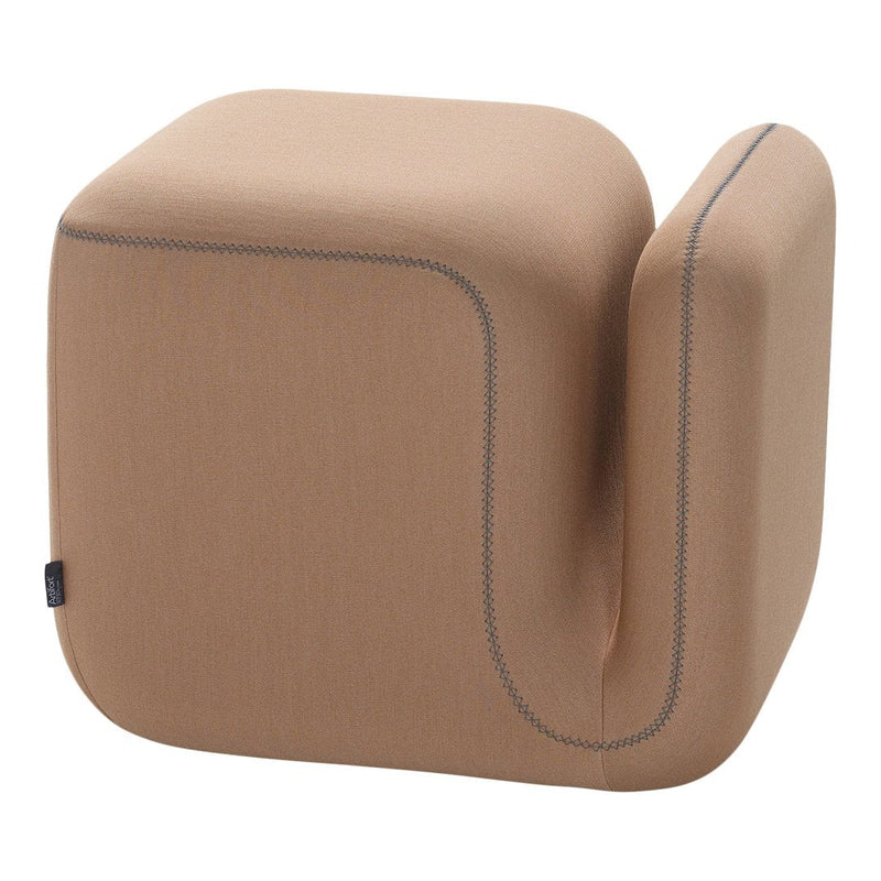 Tan cube-shaped ottoman with a smooth fabric texture and contrasting stitch detail. Modern minimalist design.