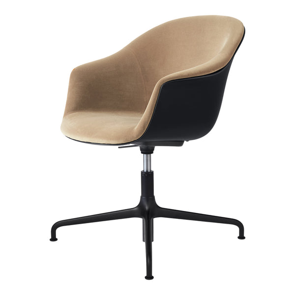 Beige velvet chair with a sleek black base, featuring a modern, minimalist design and soft curves.