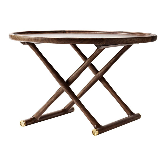 Wooden round table with a rich walnut finish and brass accents, featuring a classic cross-legged design.