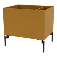 Modern two-compartment planter in warm mustard yellow with sleek black metal legs.