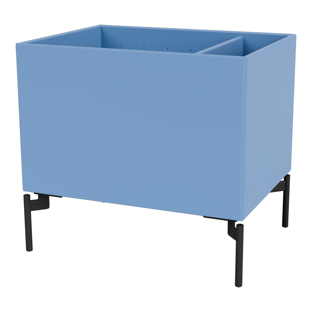 Light blue planter box with a minimalist design and black metal legs, adding a modern touch to any space.