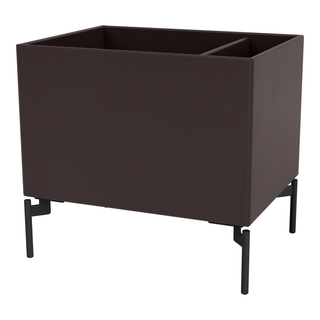 Dark brown planter with sleek black metal legs, featuring a modern and minimalist design.