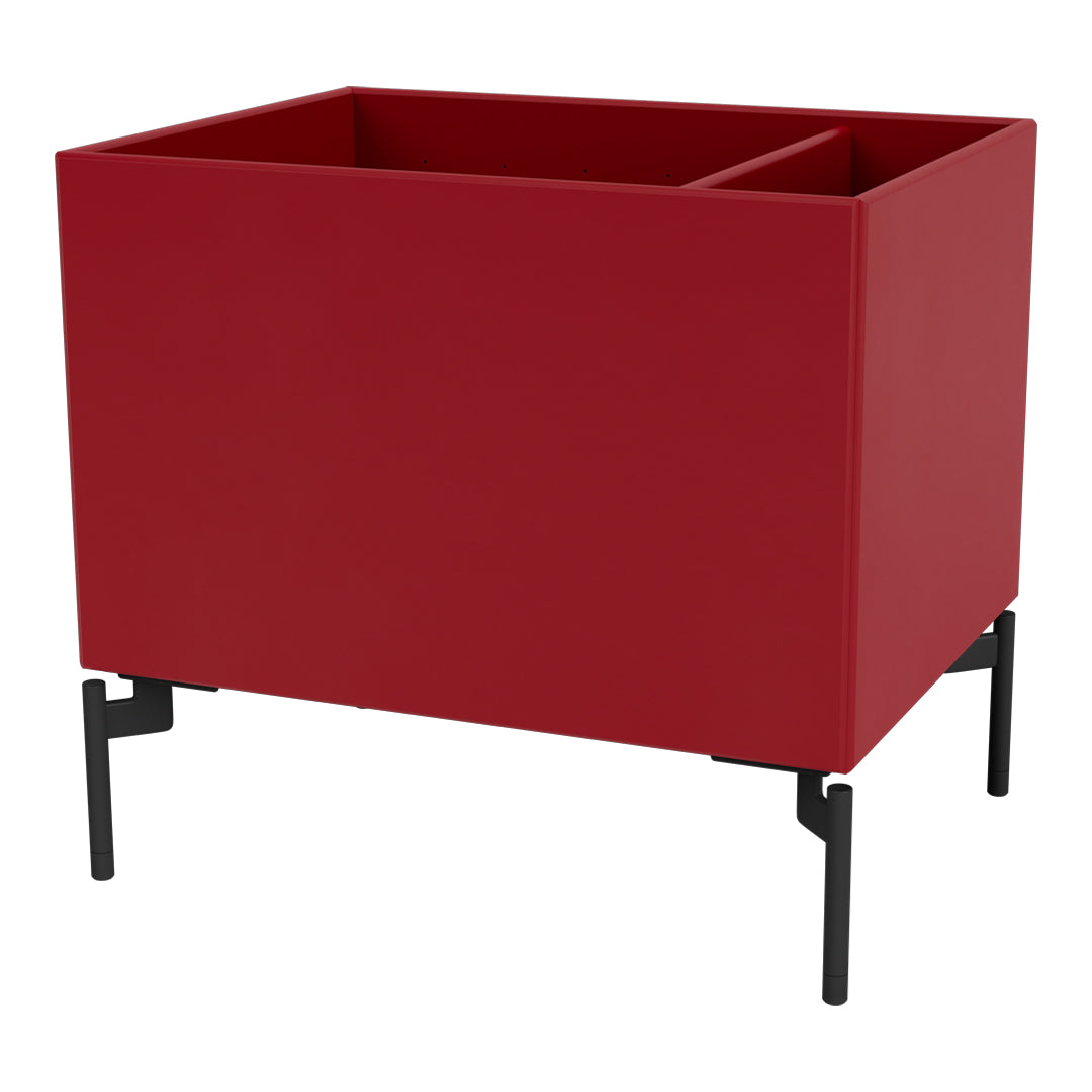 Red planter box on black metal legs, featuring a sleek, modern design with a smooth finish. Perfect for any decor.
