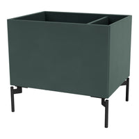 Green square planter with a matte finish, elevated on sleek black legs, featuring a clean, modern design.