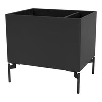 Sleek black planter box with minimalist design and stylish metal legs. Perfect for modern decor.