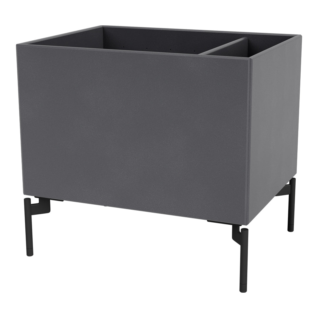 Gray planter box with a matte finish and black metal legs, featuring a modern, minimalist design.
