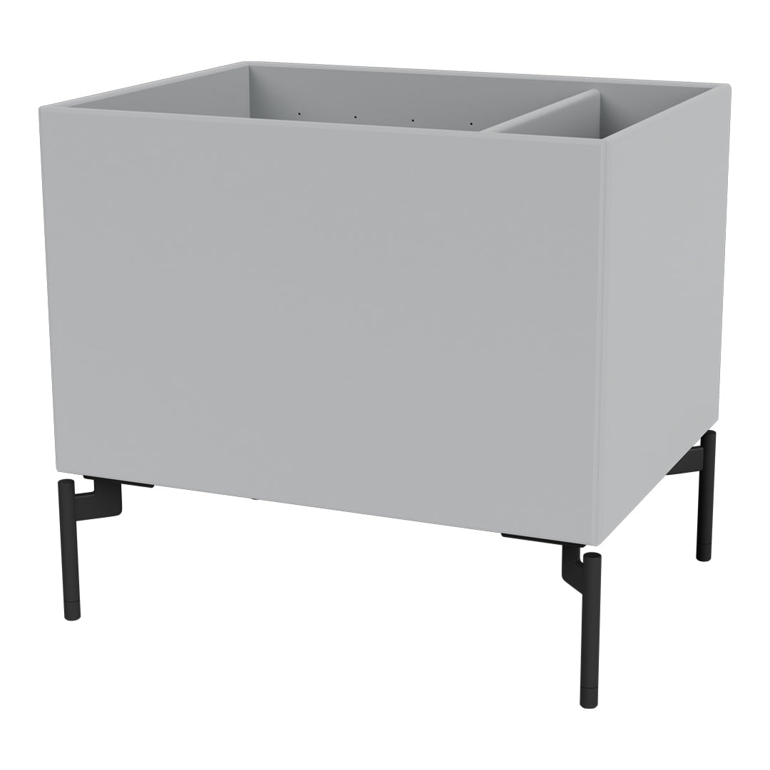Gray planter box with black metal legs and a sleek, modern design, perfect for indoor or outdoor use.