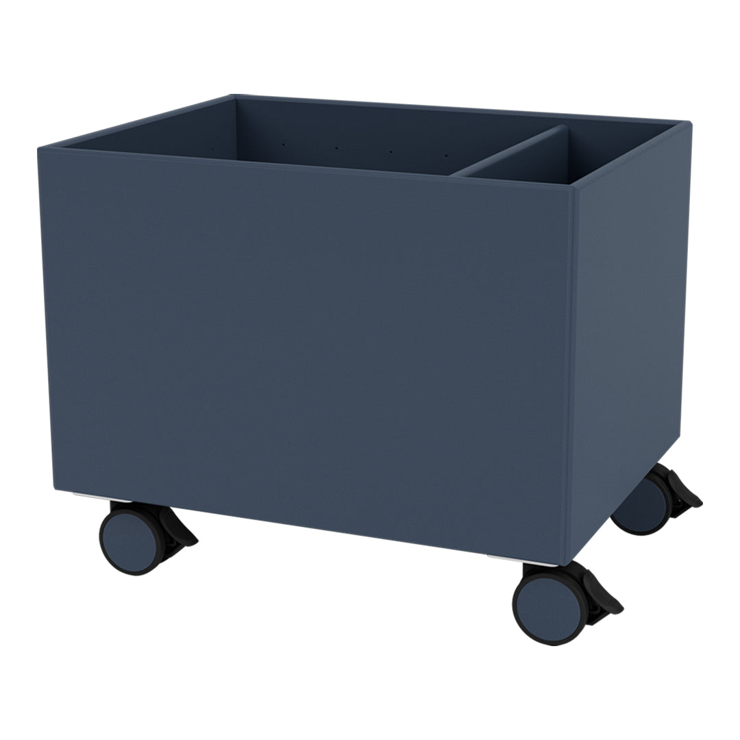 Navy blue storage bin on wheels with a smooth matte finish and modern design, featuring two divided compartments.