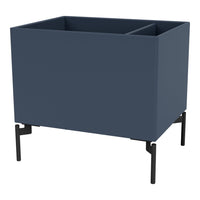 Navy blue planter box with a matte finish and minimalist black metal legs, featuring a sleek rectangular design.