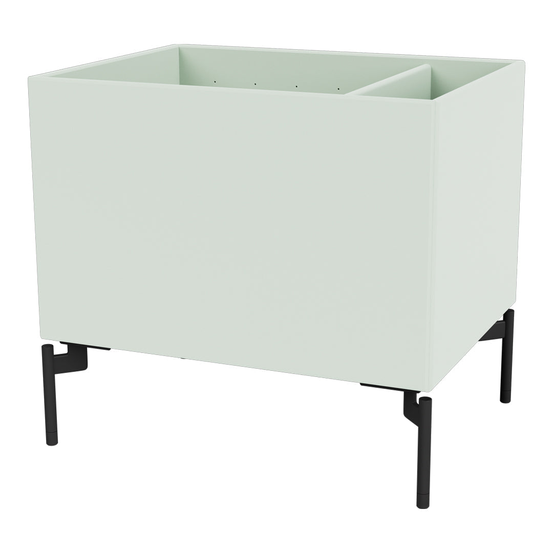 Mint green planter box with a sleek black metal stand, offering a modern minimalist aesthetic.