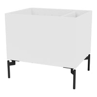 Modern white planter box with sleek black metal legs, featuring a minimalist design and clean lines.