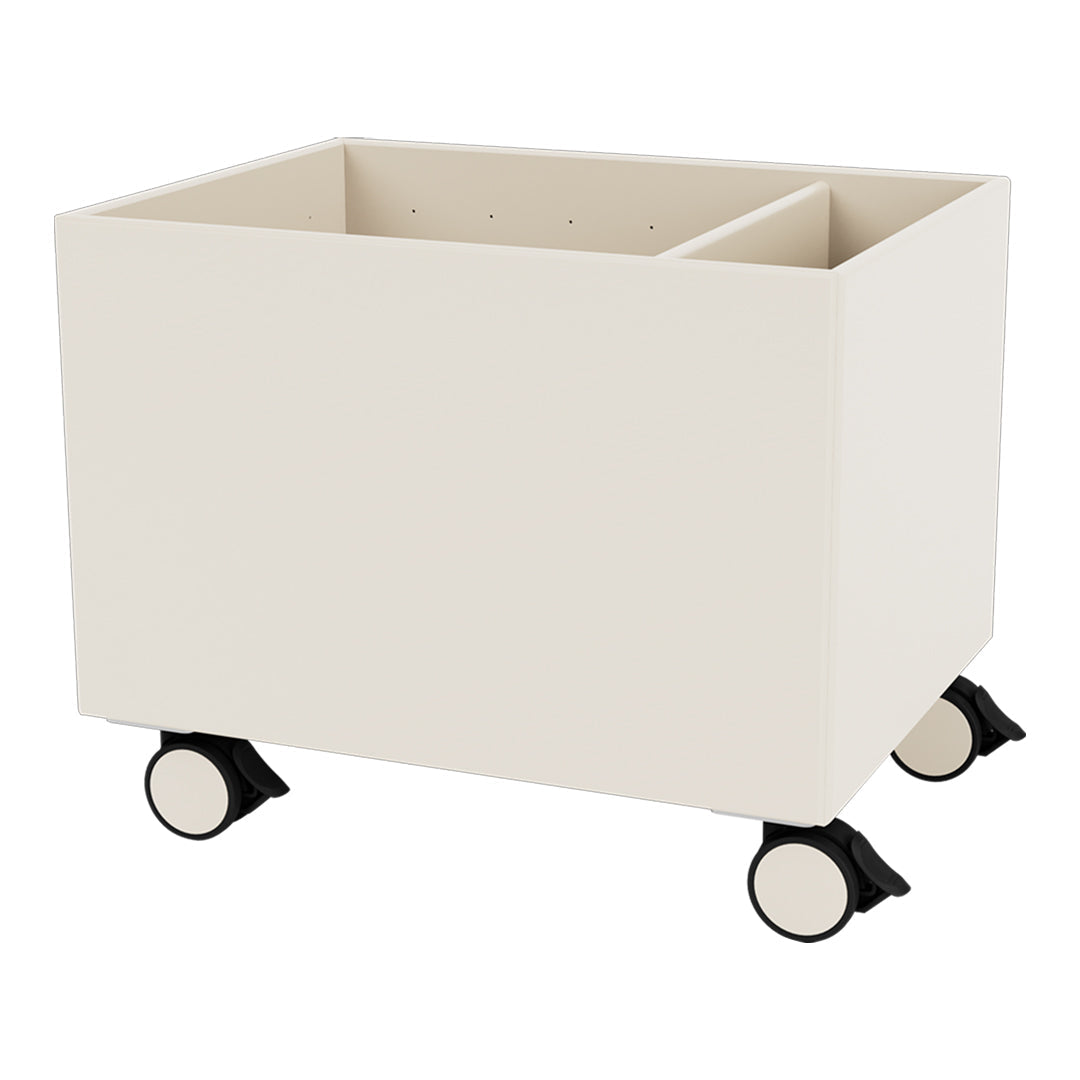 Cream-colored storage bin on wheels with a smooth, minimalist design. Features two separate compartments for organization.