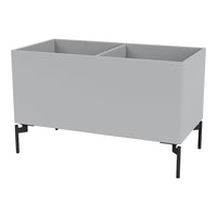 Gray storage unit with a sleek, minimalist design and black legs, featuring two spacious compartments.