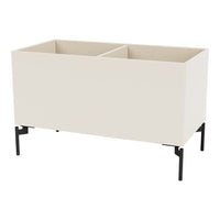 Cream-colored storage unit with a minimalist design and sleek black metal legs. Ideal for modern decor.