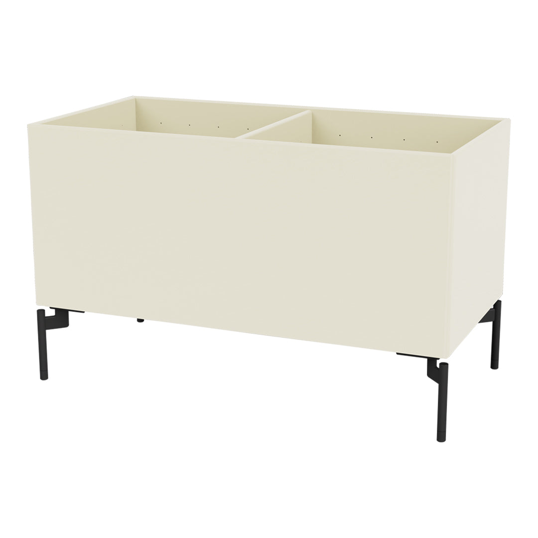 "Neutral beige storage container with a matte finish and sleek black metal legs."