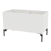 White two-compartment storage box with sleek black legs and minimalistic design. Ideal for modern decor.