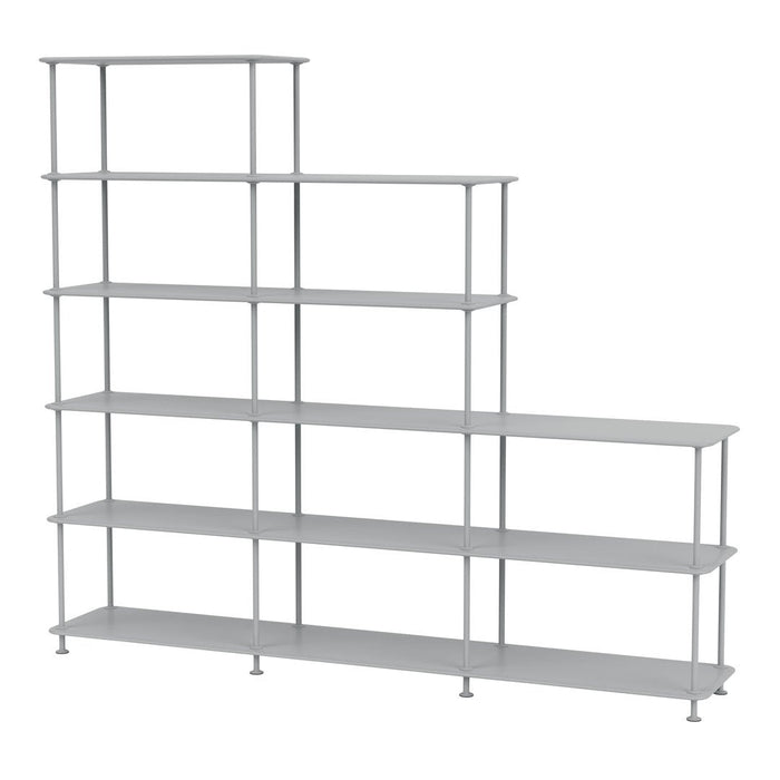 Gray metal shelving unit with a modern, staggered design and sleek, minimalistic lines.