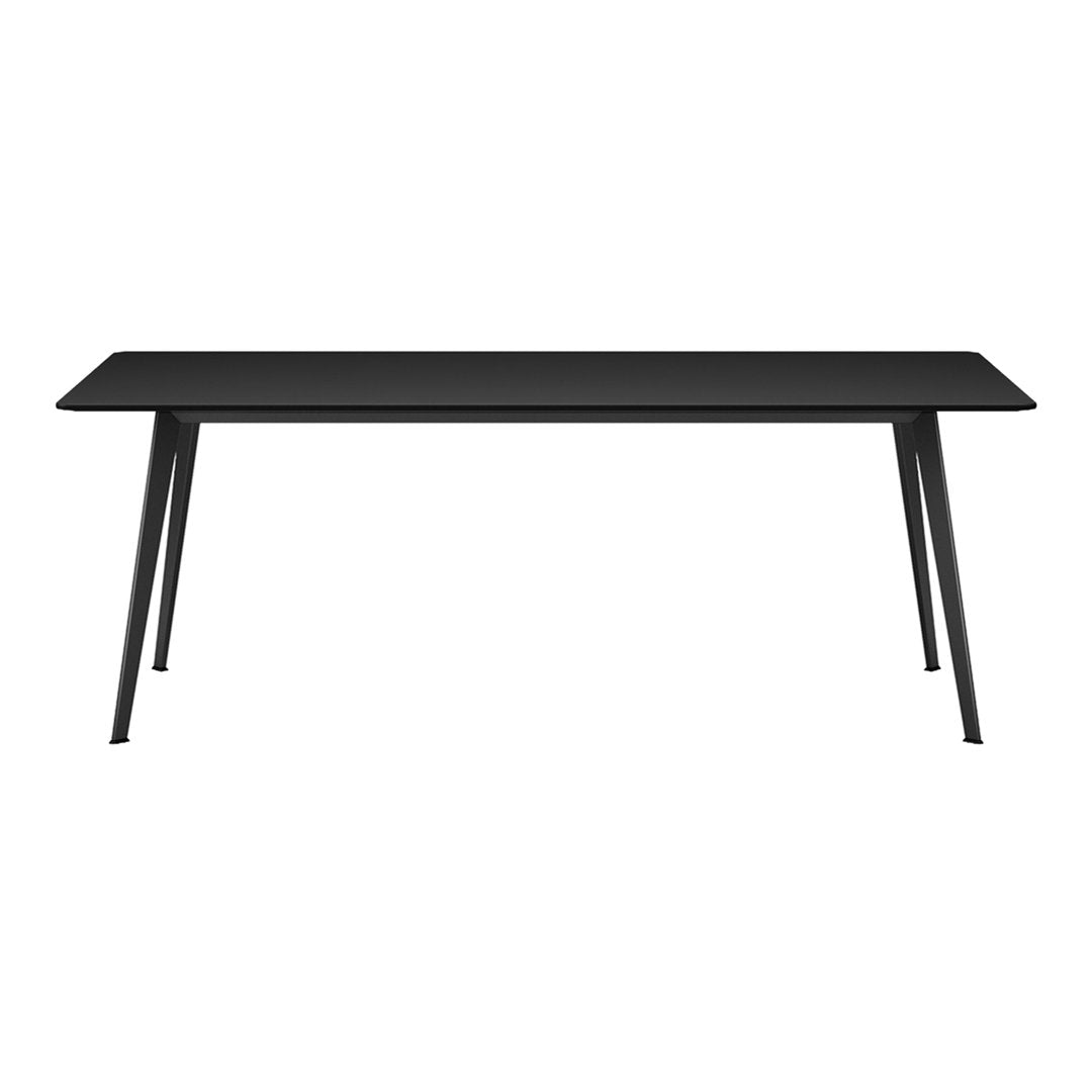 Sleek black rectangular dining table with modern minimalistic design and sturdy black legs. Perfect for contemporary spaces.