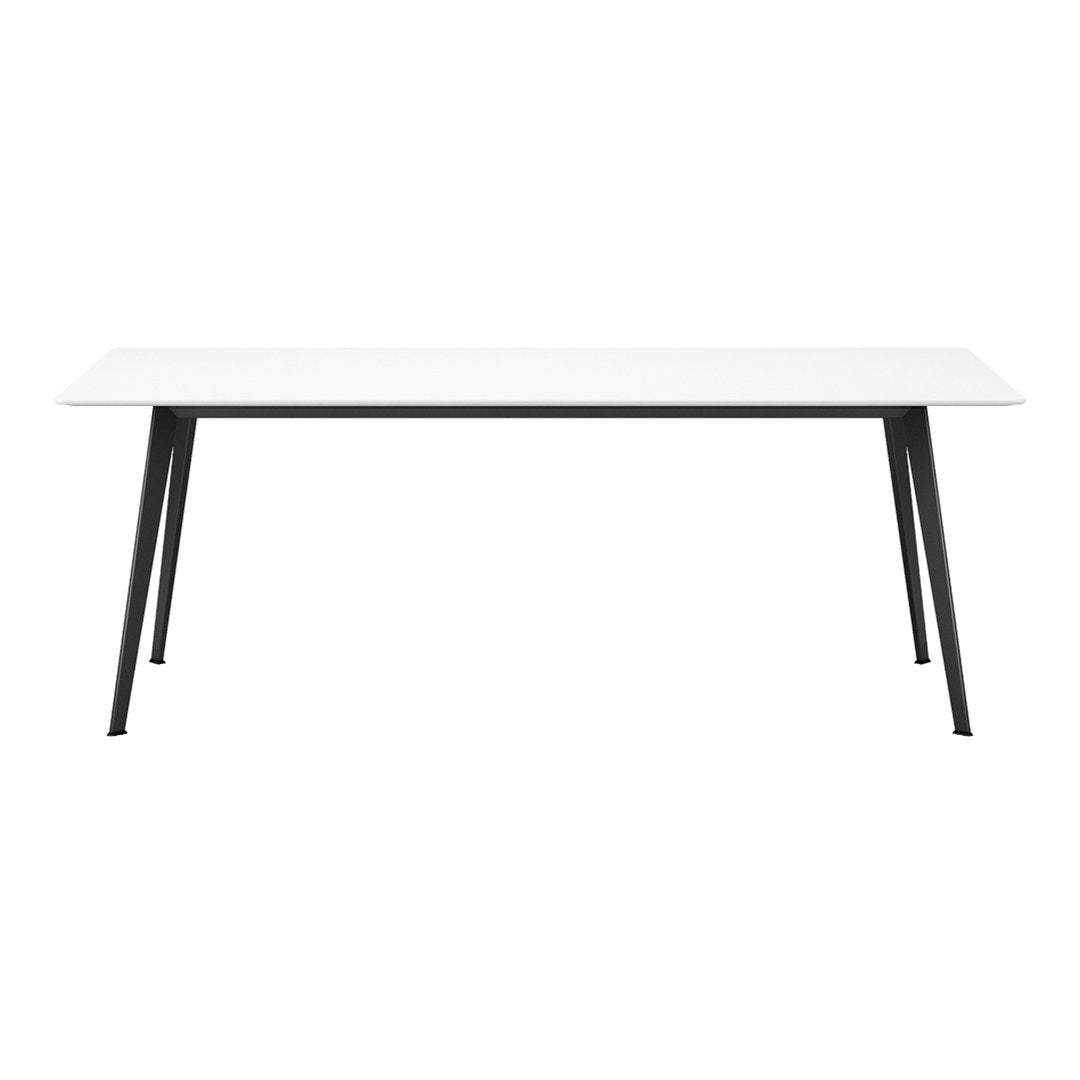 White table with sleek black legs, featuring a modern minimalist design for contemporary spaces.