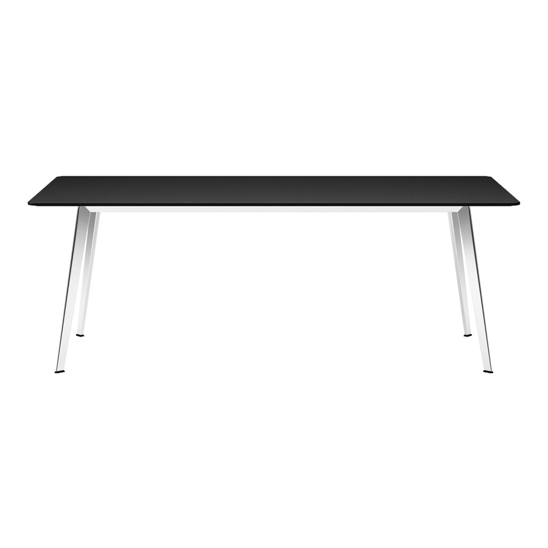 Sleek black tabletop with modern white legs, perfect for contemporary decor.