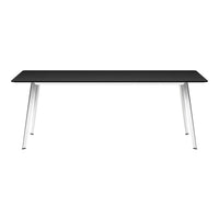 Sleek black tabletop with modern white legs, perfect for contemporary decor.