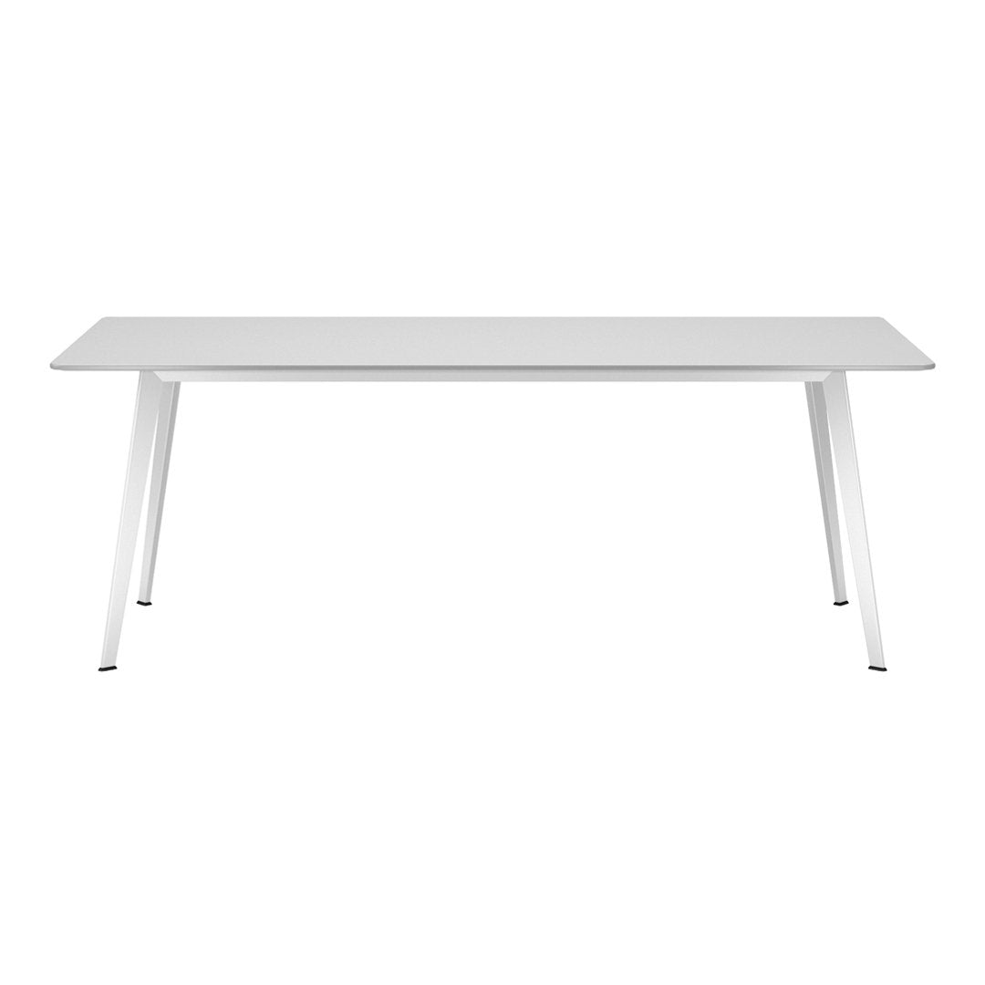 Sleek white rectangular table with minimalist design and clean lines, ideal for modern interiors.