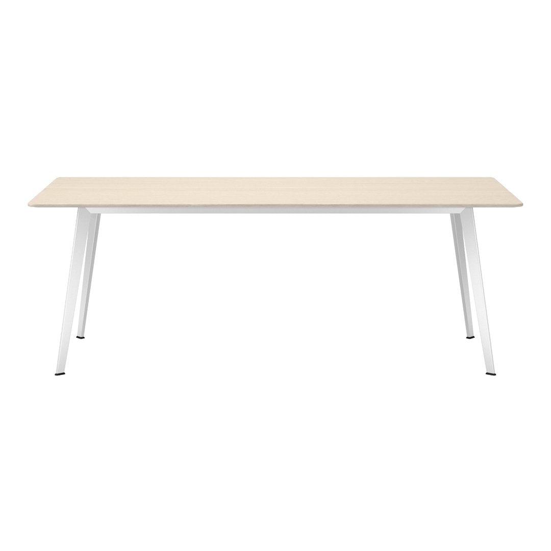 Light wood tabletop with a smooth finish, paired with sleek white metal legs for a modern aesthetic.