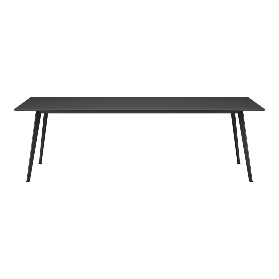 Sleek black rectangular table with minimalist design and slim black legs, adding modern elegance to any space.