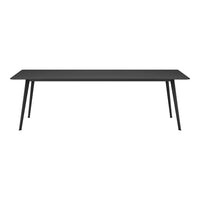 Sleek black rectangular table with minimalist design and slim black legs, adding modern elegance to any space.