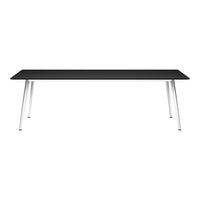 Black table with sleek white metal legs, featuring a modern and minimalist design. Perfect for contemporary spaces.