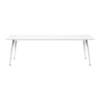 Sleek, modern white table with minimalist design and silver metal legs. Perfect for contemporary decor.