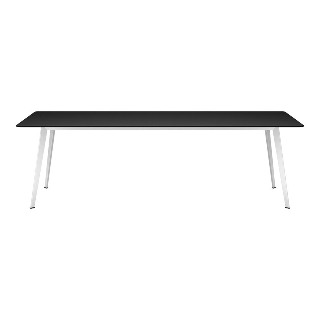 Modern black tabletop with sleek white legs, featuring a minimalist design and clean lines. Perfect for contemporary spaces.