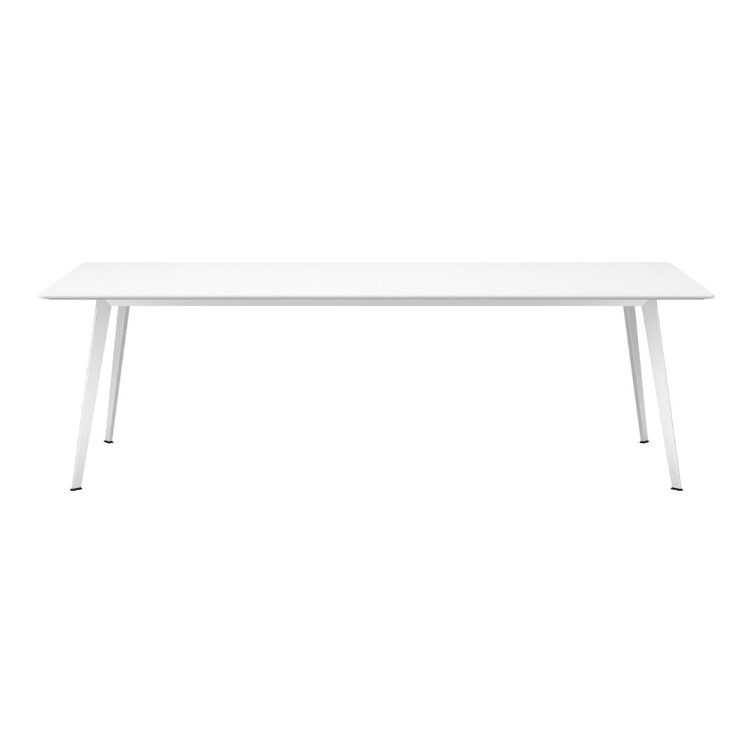 White rectangular table with sleek chrome legs, minimalist design, and smooth surface, perfect for modern decor.