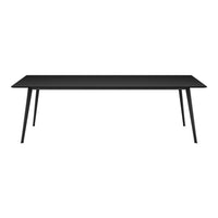 Modern black dining table with a sleek, minimalist design and tapered legs, perfect for contemporary interiors.