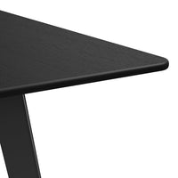 Close-up of sleek black table surface with a wood grain pattern; modern, minimalist design for any contemporary space.