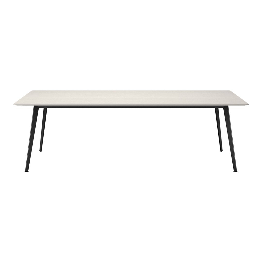 Light beige tabletop with a smooth finish and sleek black metal legs, perfect for modern decor.