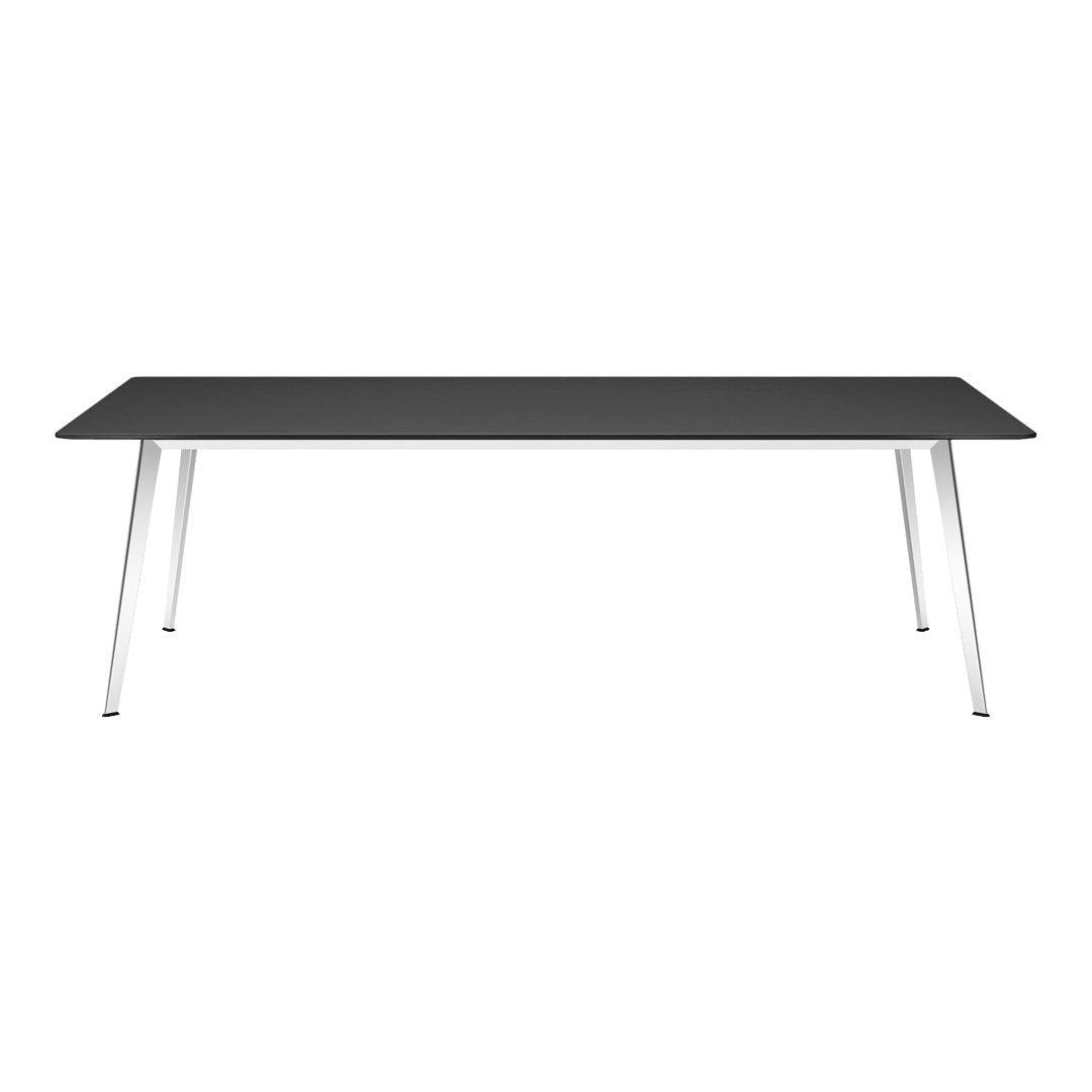 Sleek black tabletop with modern silver legs, featuring a minimalist design perfect for contemporary spaces.