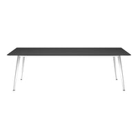 Sleek black tabletop with modern silver legs, featuring a minimalist design perfect for contemporary spaces.