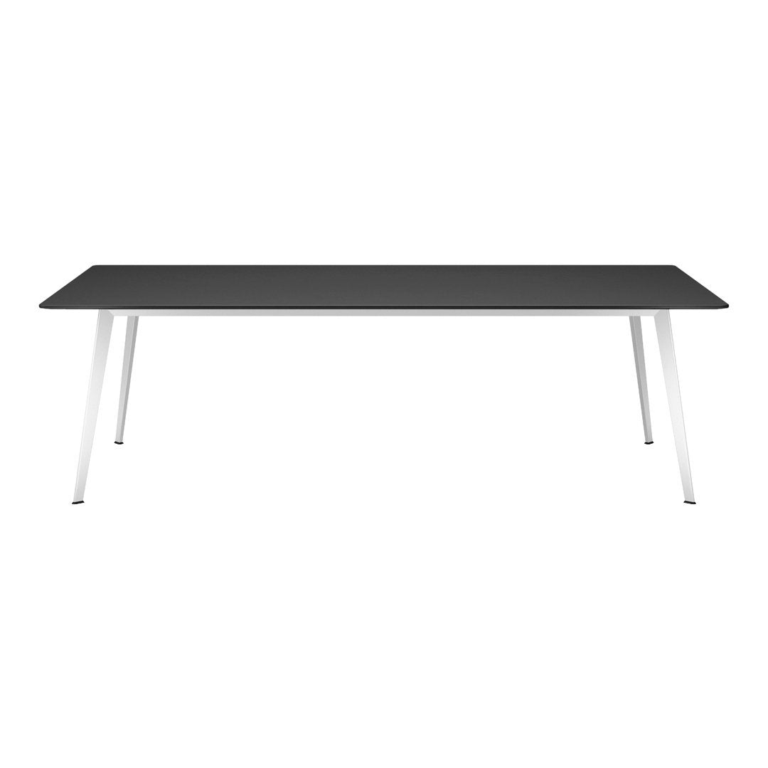 Sleek black tabletop with modern white legs, perfect for contemporary dining or office decor.